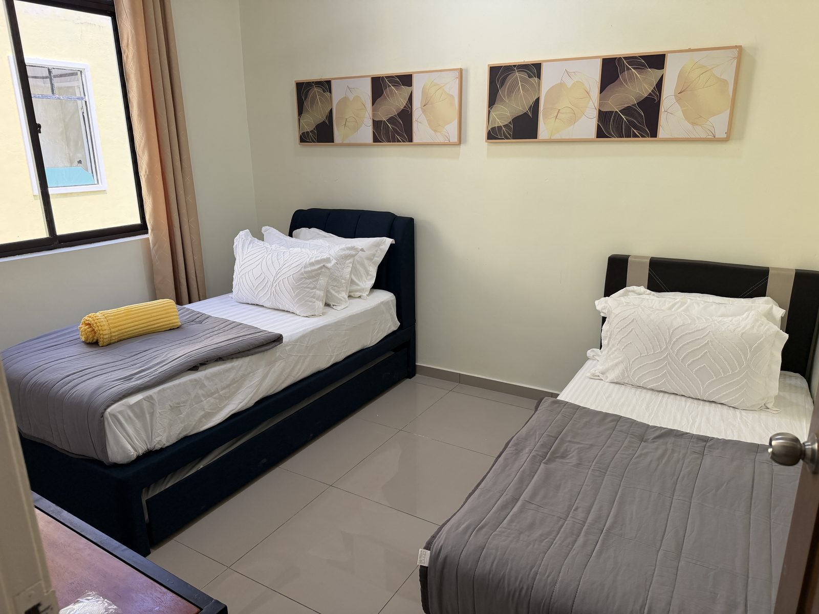 Twin bedroom in the 3 Bedroom Oceanfront Villa